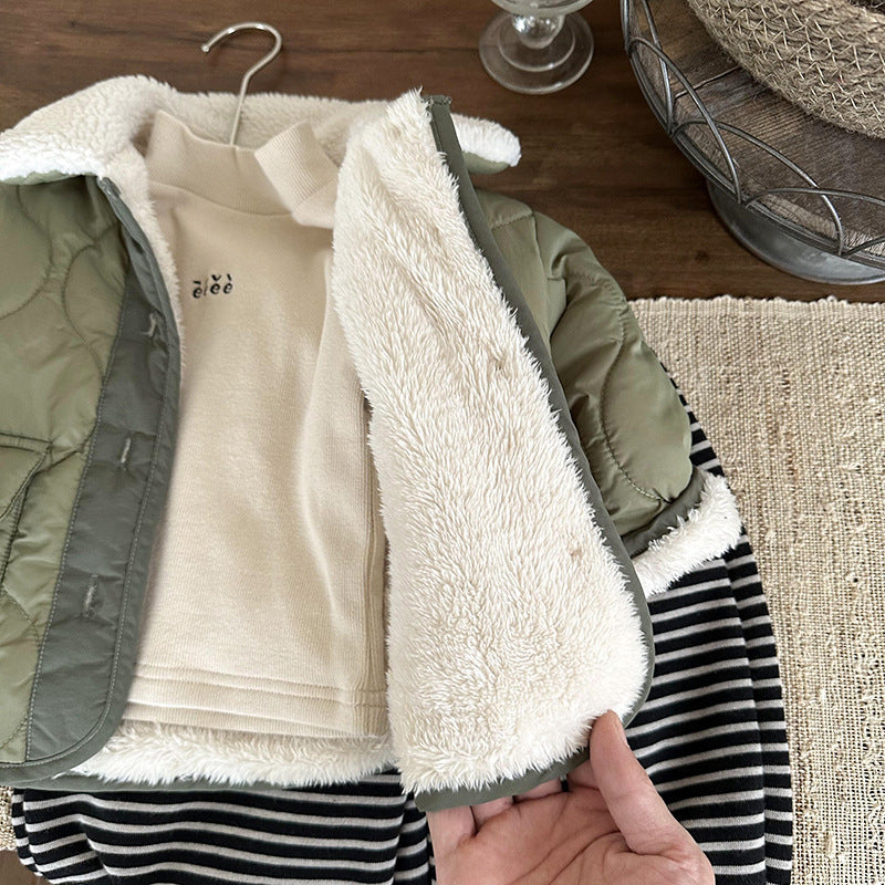 Green quilted jacket opened to show sherpa lining