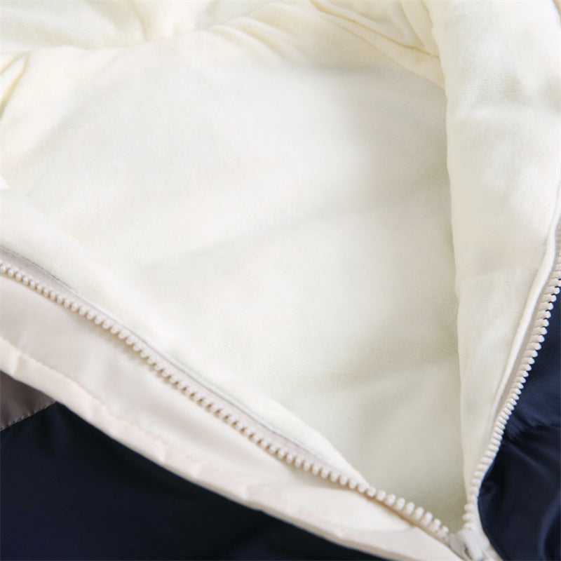 Inside view of fleece lining and zip on baby snowsuit