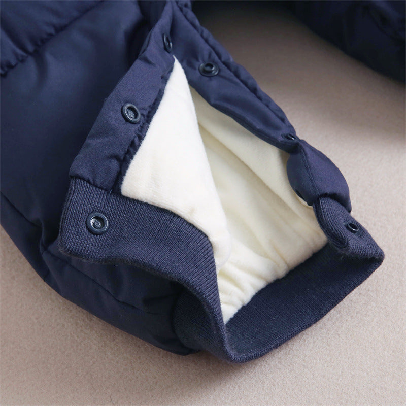 Snowsuit leg opened at the snaps showing lining