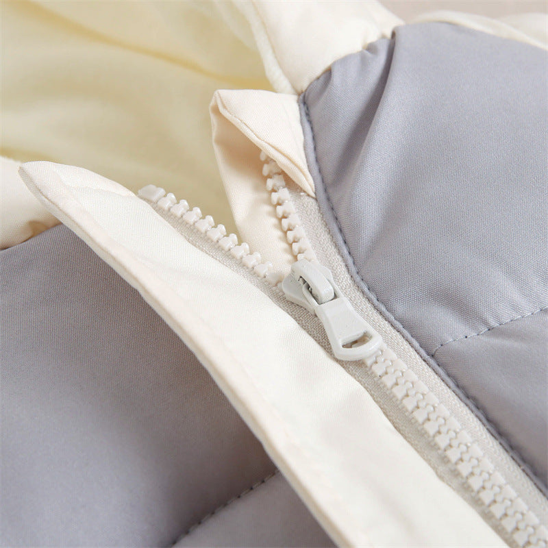 Close-up of front zip on padded baby snowsuit