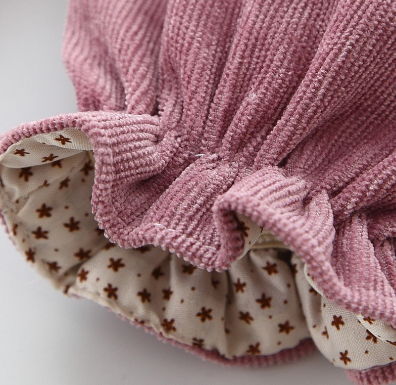 Close-up of star print lining at dress hem