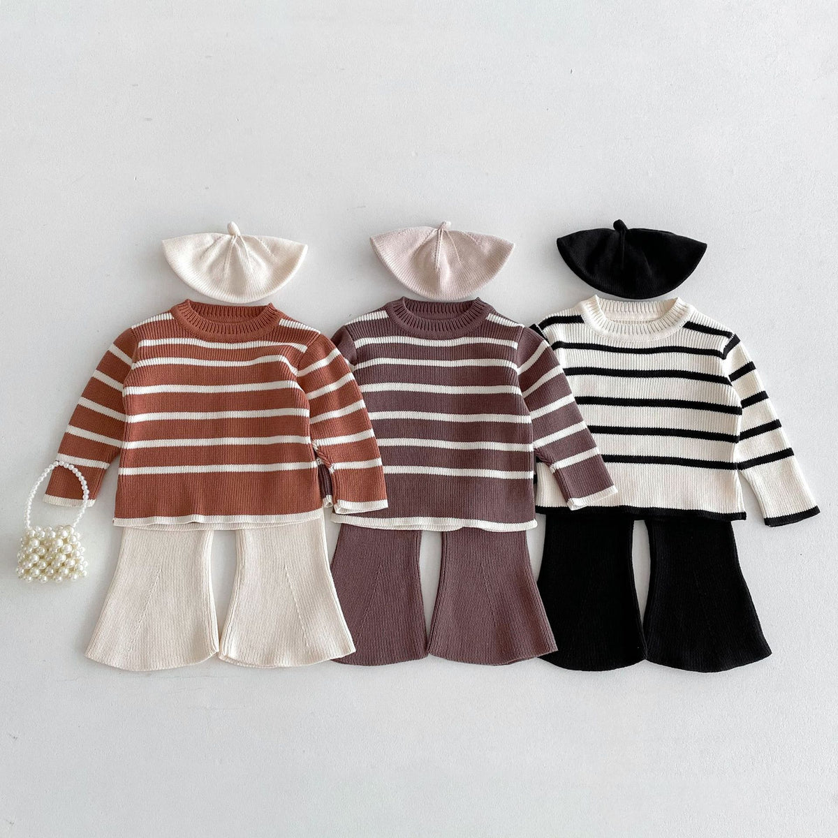 Striped knit sweater and flared trousers sets for baby girls in rust, plum and black