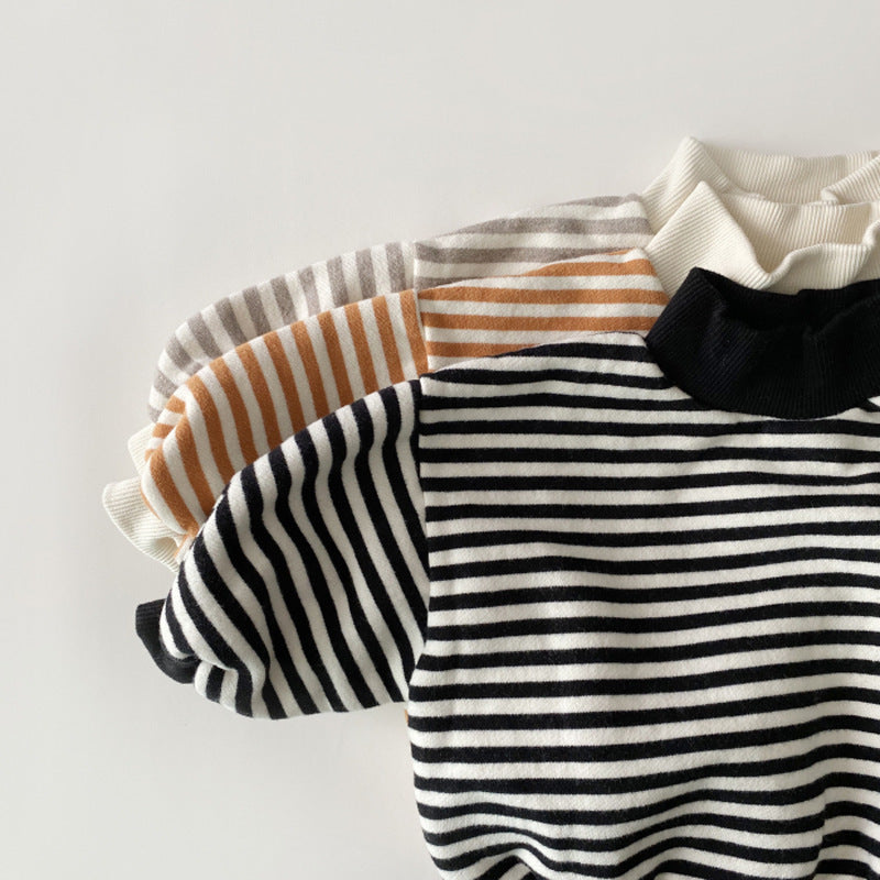 Orange and black striped mock neck sweaters stacked