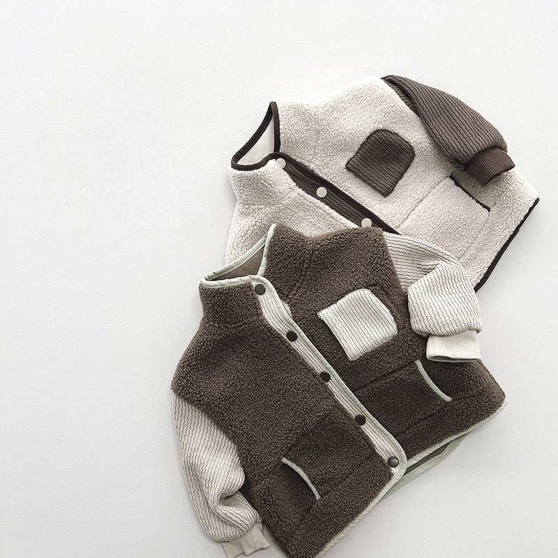 Brown and beige teddy fleece jackets layered