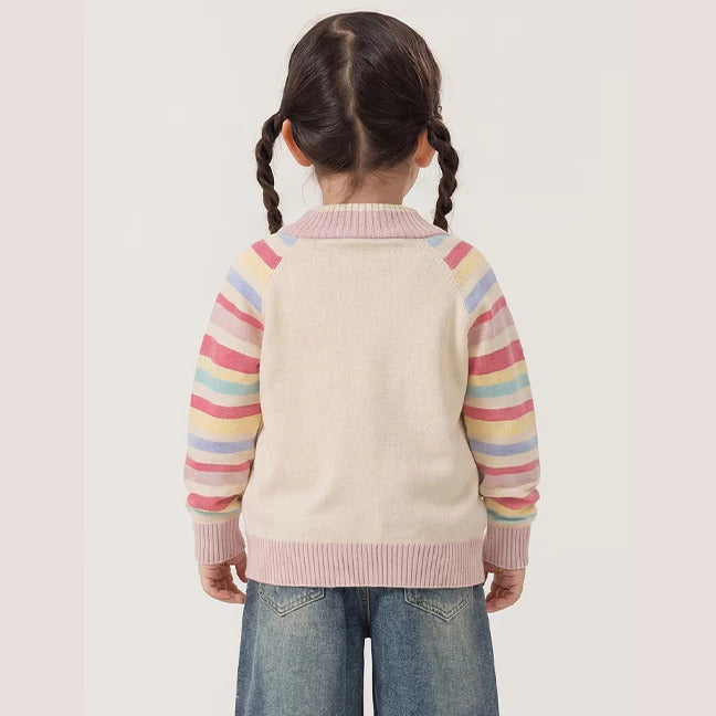 Back view of a girl wearing the rainbow-sleeve cardigan