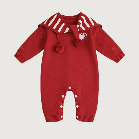Cherry red knit baby romper with striped sailor cape and pompoms
