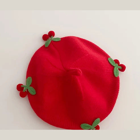Cherry Red knit baby beret with crochet cherries, flat lay