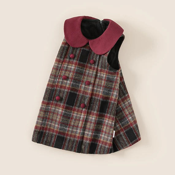 Side view of girls tartan pinafore dress with fleece lining and button front