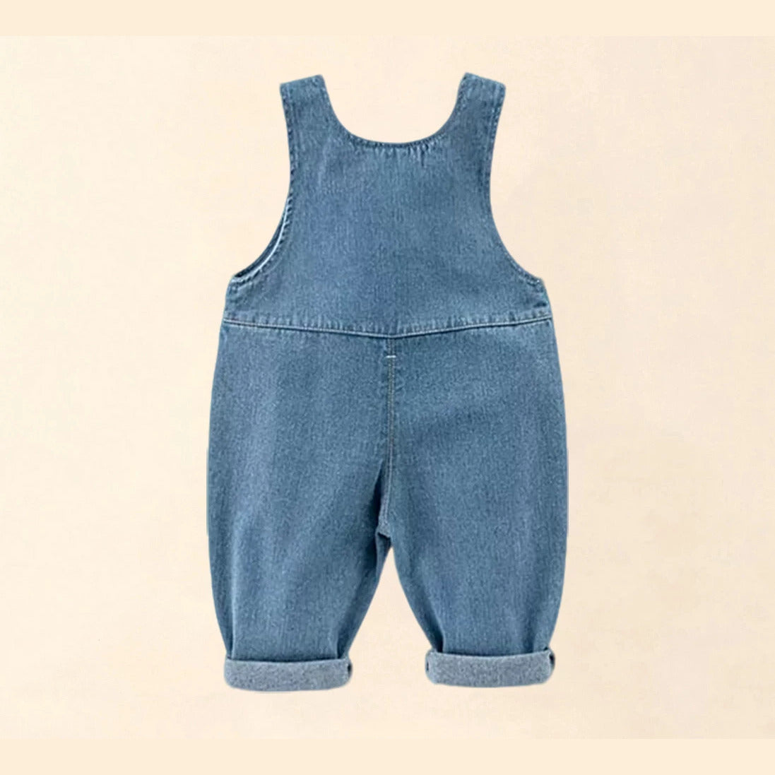 Back view of light-wash denim kids overalls