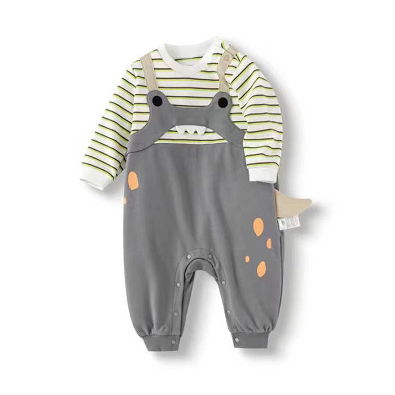 Grey baby romper with a striped long-sleeve top, dino face, orange spots and a little tail, flat lay