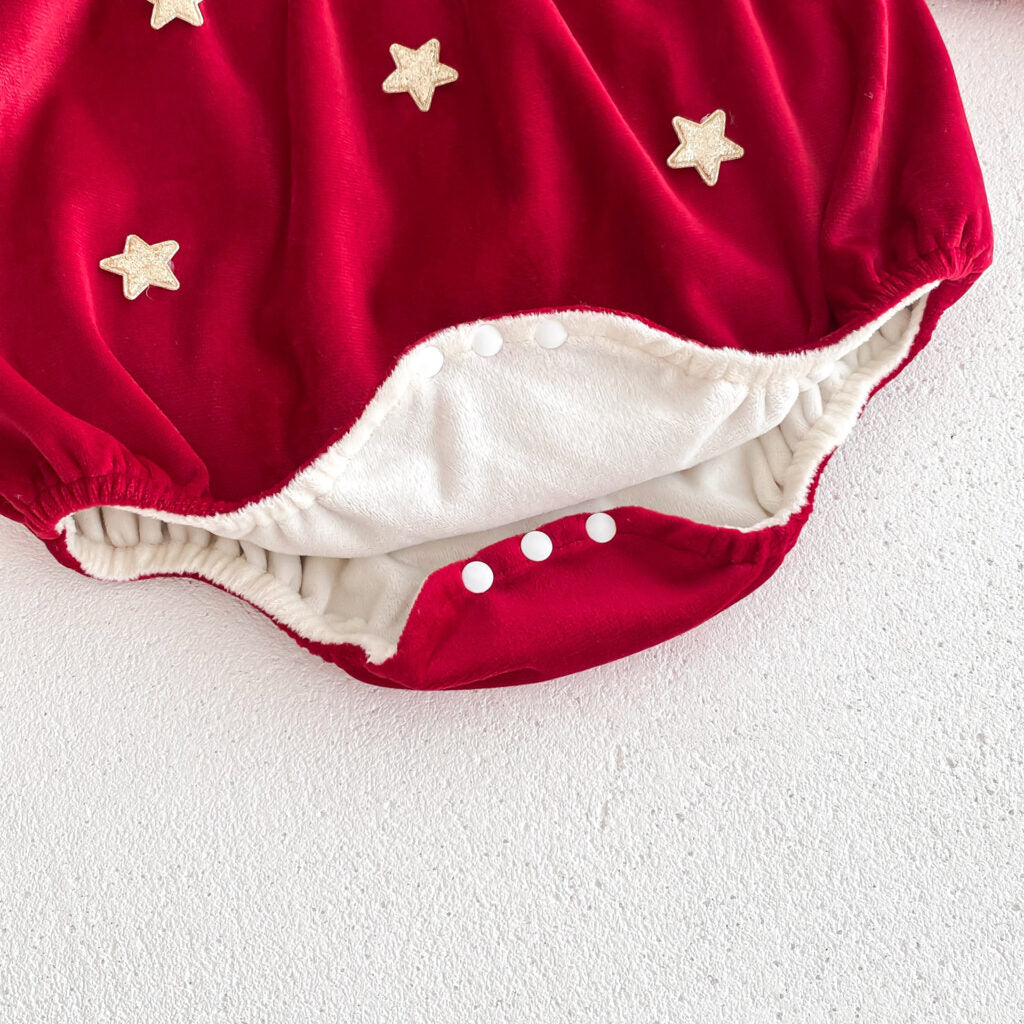 Snap crotch closure on red velvet romper