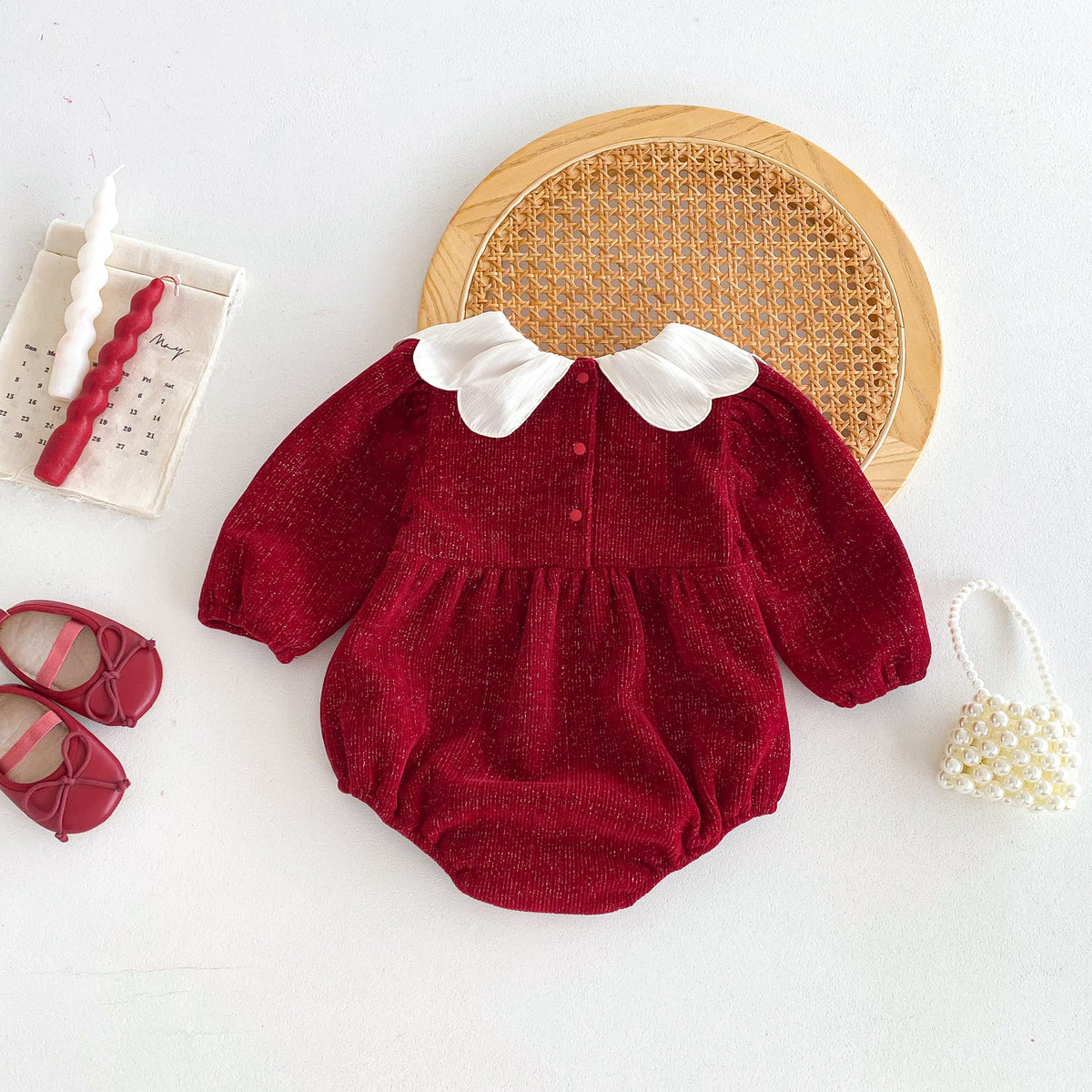 Vintage style scarlet baby romper with white petal collar