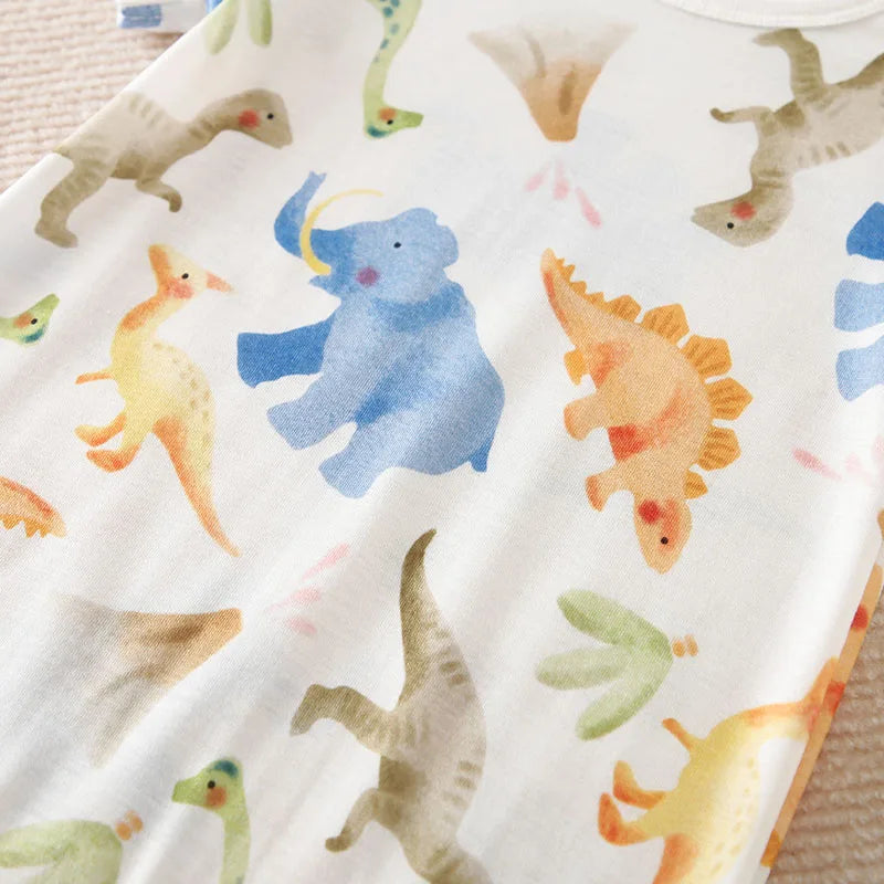 Close-up of watercolour dinosaur and elephant print
