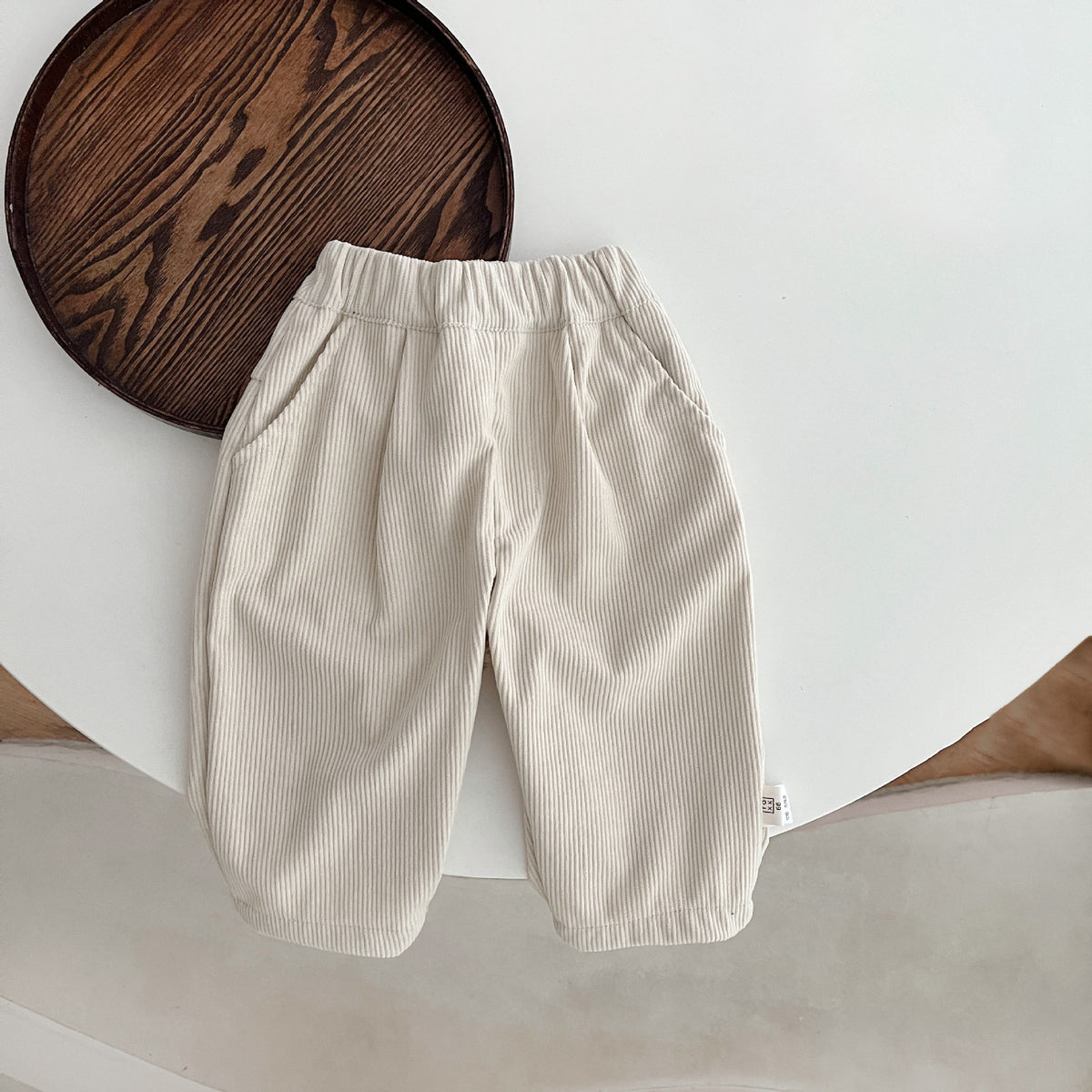 White corduroy baby pants