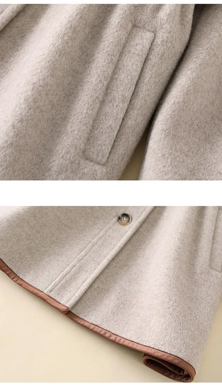 Close-up of pocket and hem on wool coat