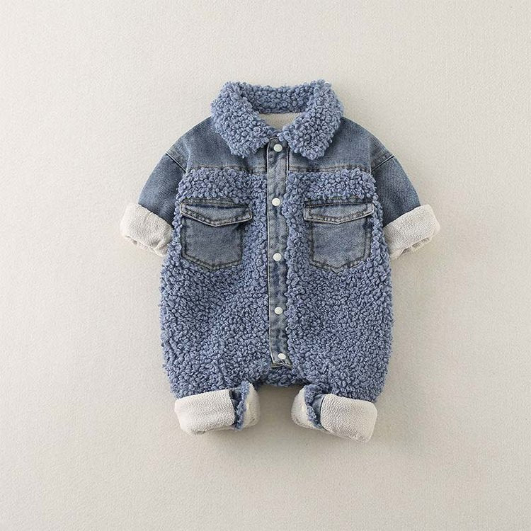 Cozy and stylish baby romper combining denim and soft fleece materials for a unique look. The romper features a fluffy blue sherpa fleece front with denim accents on the chest pockets, collar, and sleeves, giving it a trendy, layered appearance. The cuffs are rolled up to show a soft, warm lining, perfect for cooler weather. Designed with snap buttons down the front for easy dressing and changing, this outfit is both practical and fashionable, ideal for fall and winter baby wardrobes.