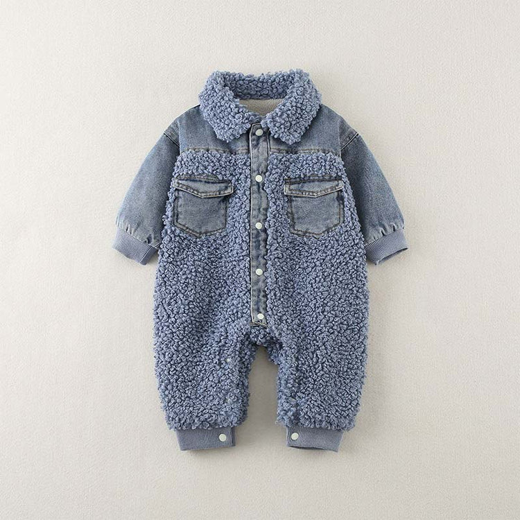 Stylish and warm baby romper designed with a blend of denim and blue sherpa fleece, perfect for colder seasons. This one-piece outfit features soft fleece on the front and legs, with denim accents on the chest, pockets, collar, and sleeves for a fashionable layered look. The romper has ribbed cuffs at the sleeves and ankles for added warmth and comfort, along with snap buttons down the front for easy dressing.