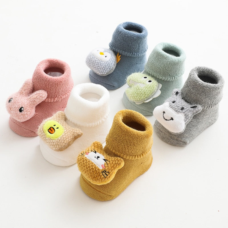 Group of thick non-slip baby socks with animal toppers