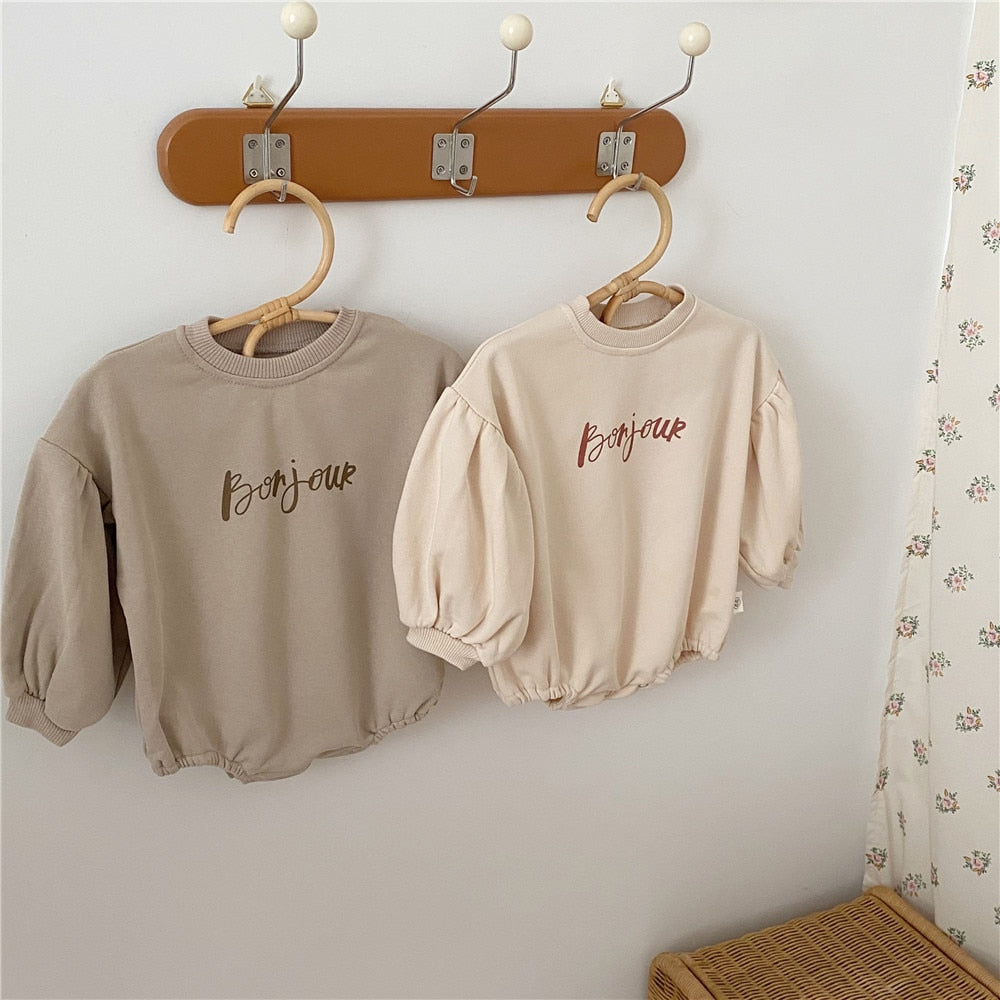 Baby Bonjour puff sleeve rompers hanging