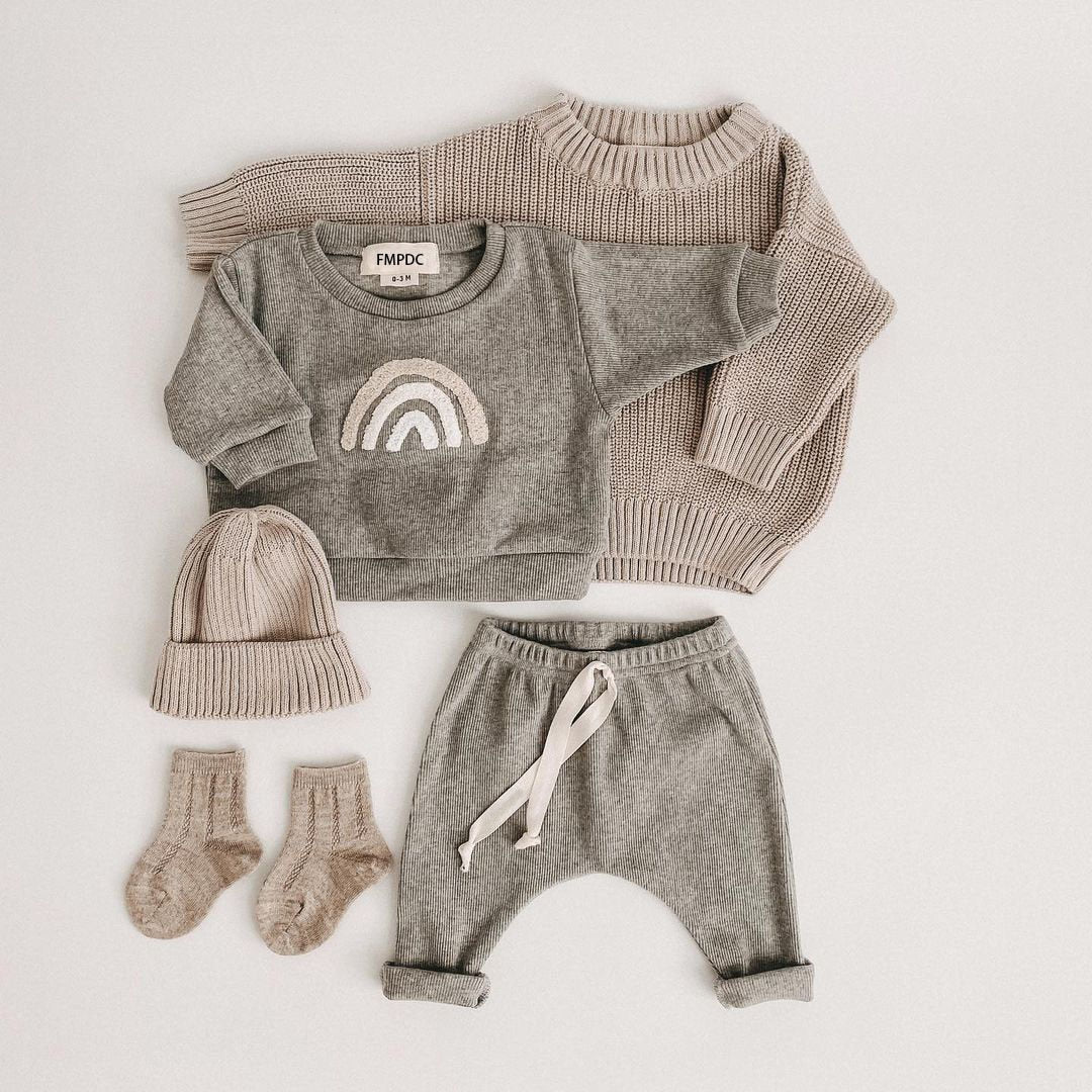 Dark grey rainbow sweatshirt and jogger set flat lay