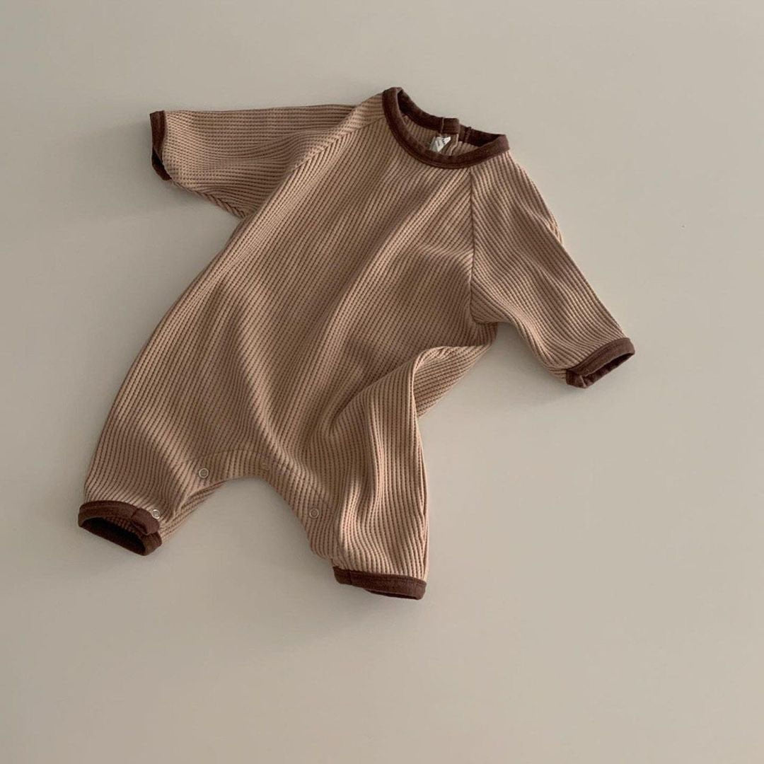 Auburn waffle knit baby romper flat lay
