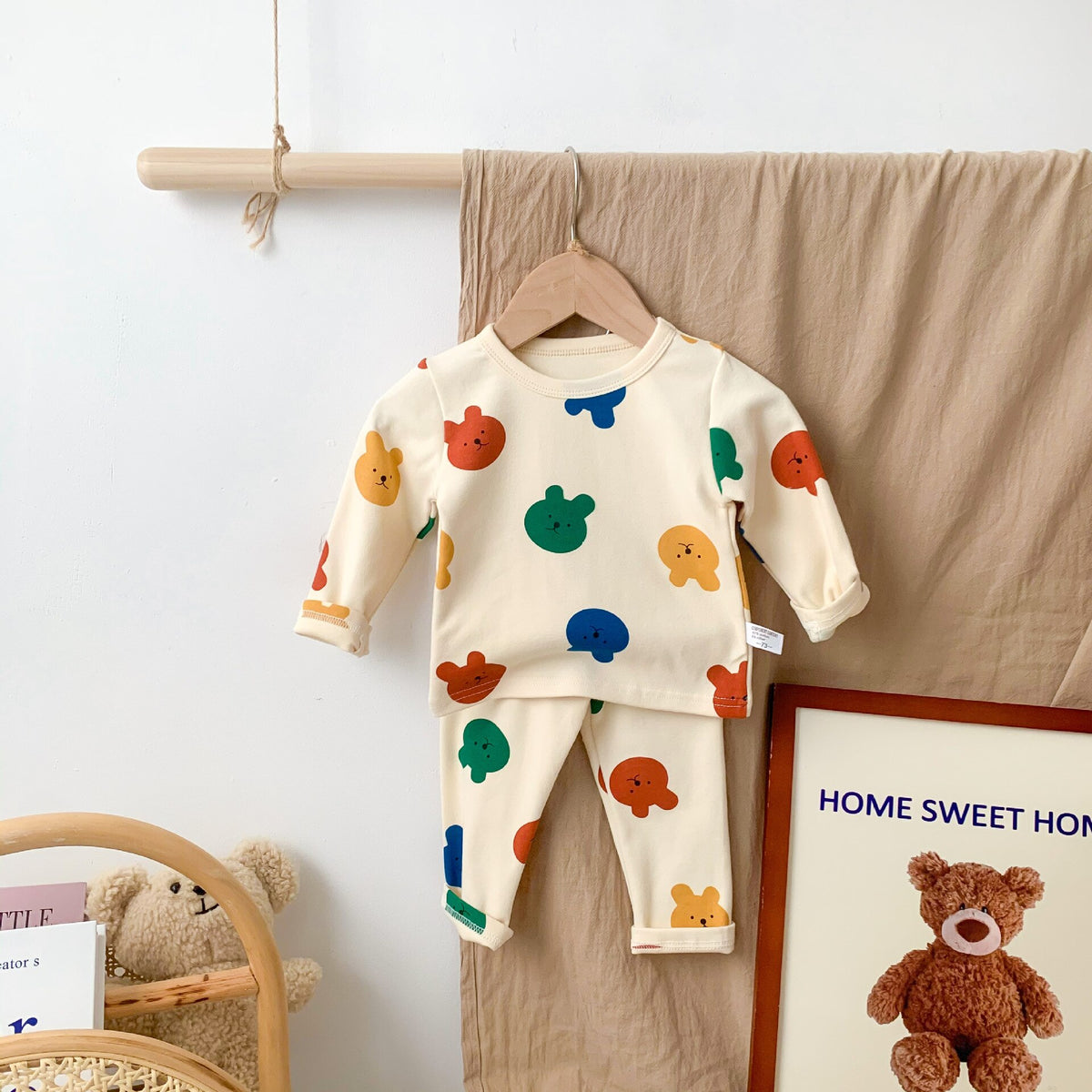 Bear print pajamas hanging on a rail