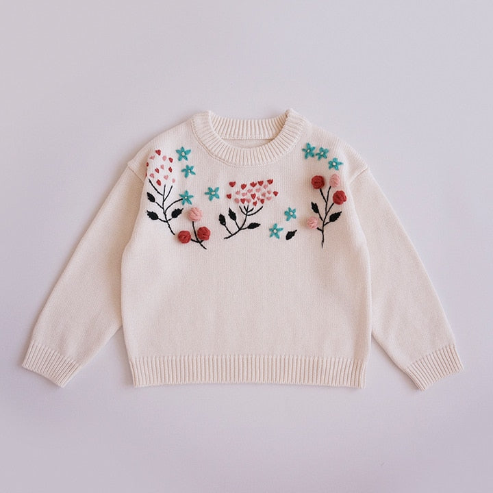 Beige knit pullover with floral embroidery