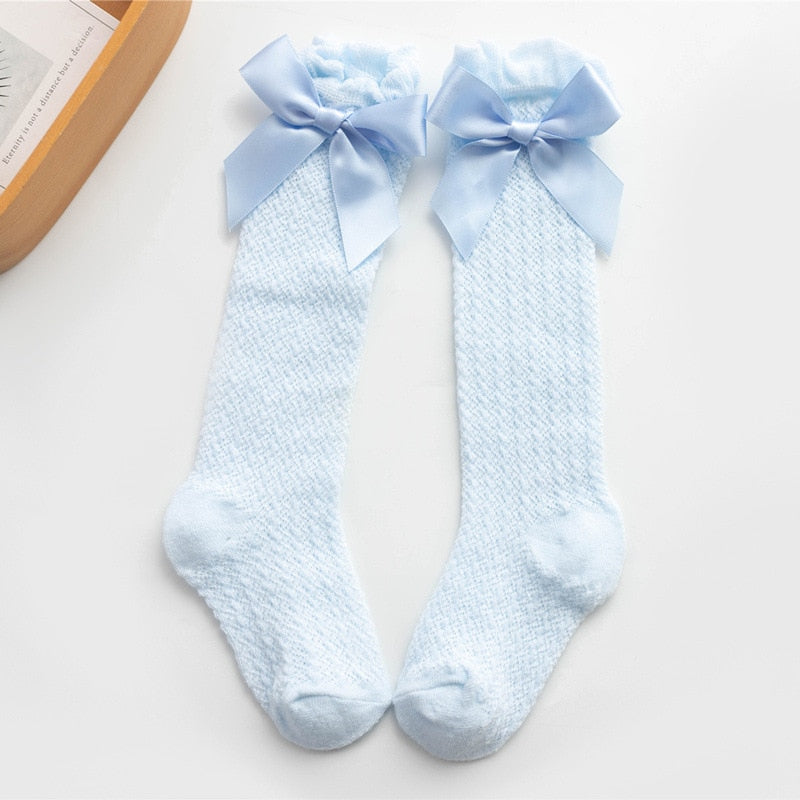 Light blue openwork knee socks with bows