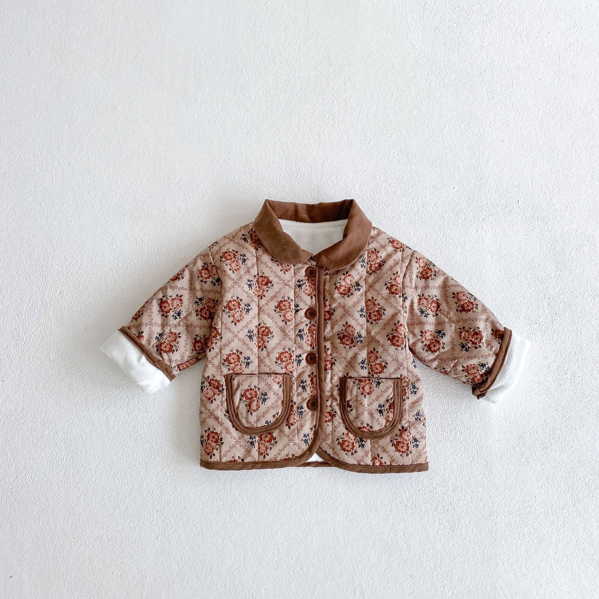 Brown floral quilted baby jacket