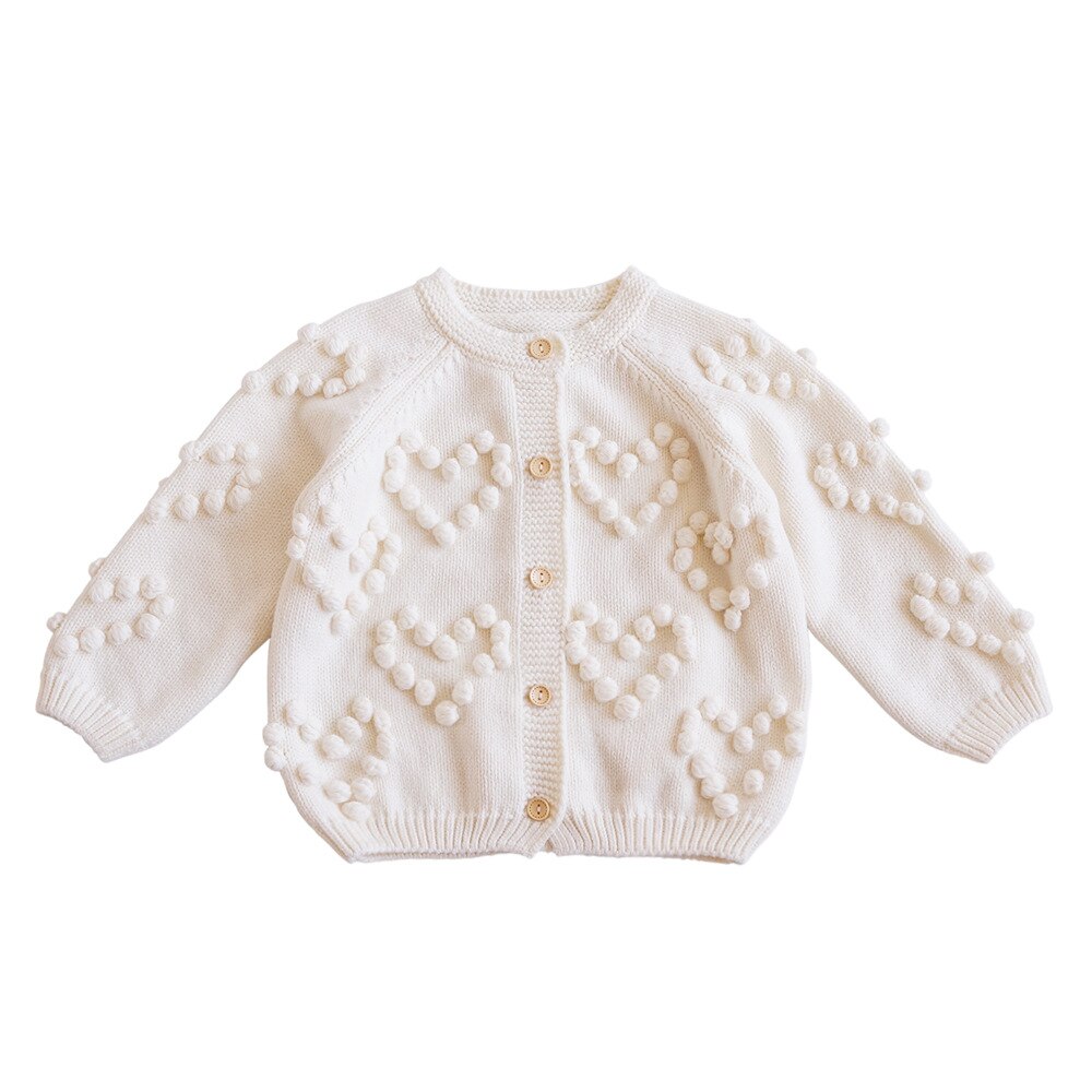 Cream bobble heart cardigan on white background