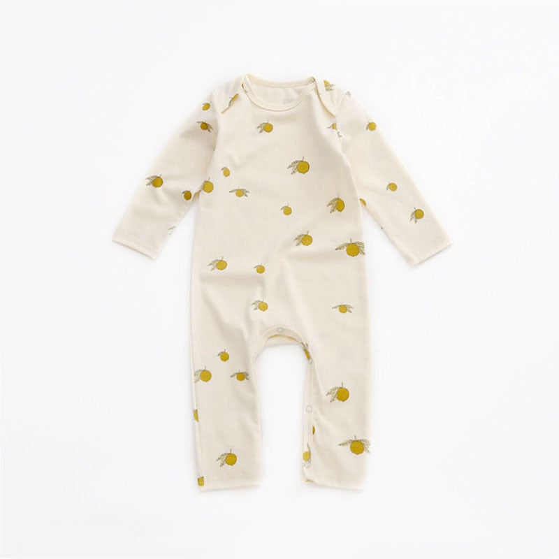 Cream baby romper with small sunshine print