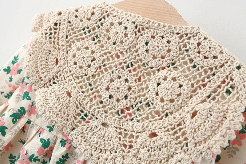 Close-up of crochet lace shawl back