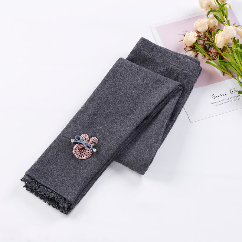 Dark gray leggings with lace hem and brooch