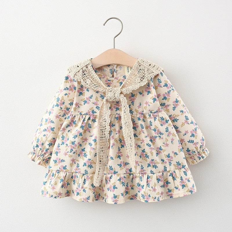 Floral dress with crochet shawl tied at front