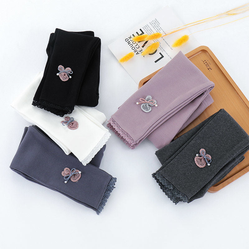 Girls cotton leggings in five colours laid flat