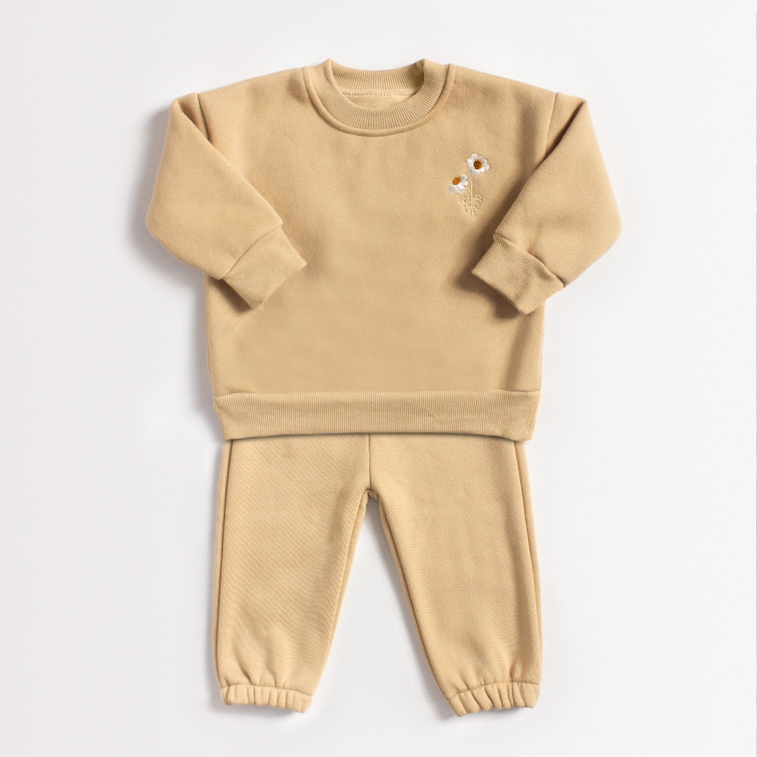 Khaki daisy sweatshirt and joggers on white background