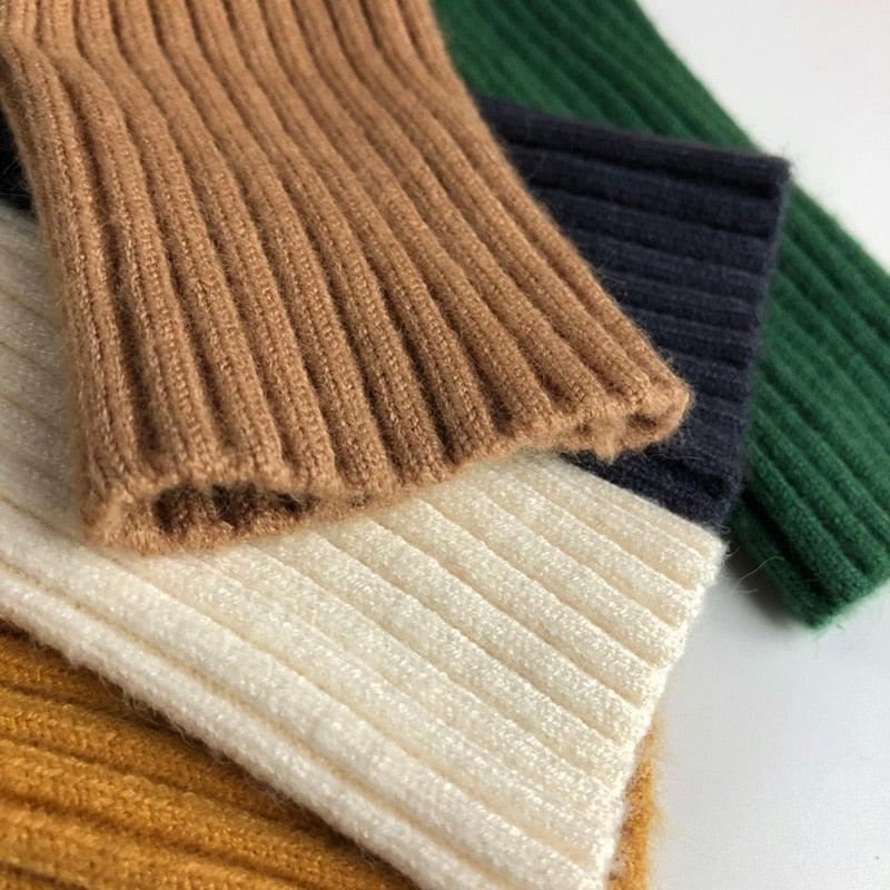 Close-up of chunky rib knit cuffs
