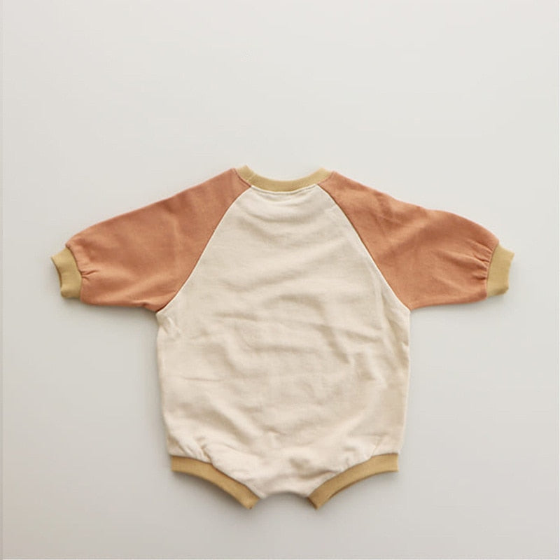 Peach and cream colour block baby romper