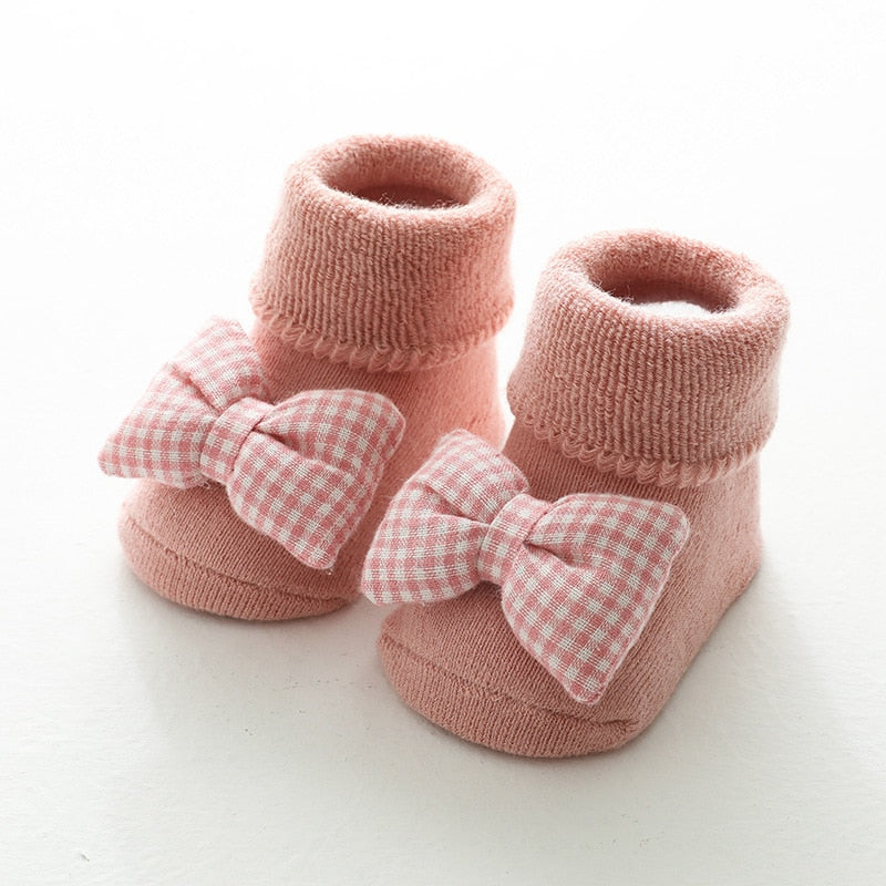 Pink thick baby socks with gingham bows