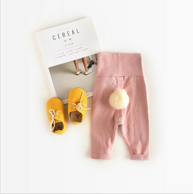 Pink bunny tail leggings with yellow shoes