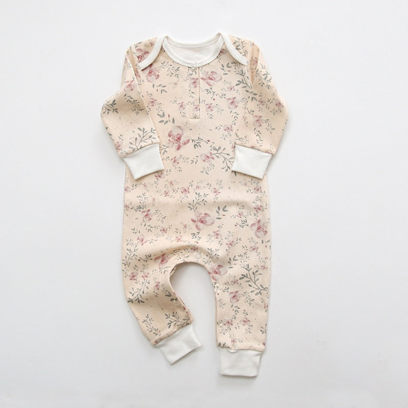 Pale pink floral print baby romper