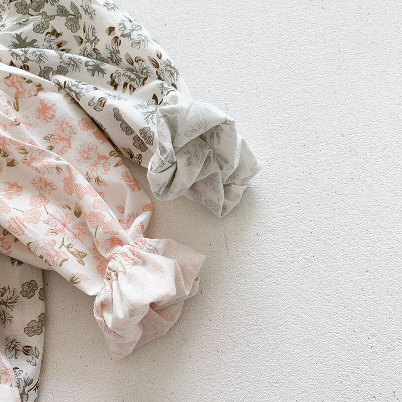 Close-up of pink floral sleeve cuff