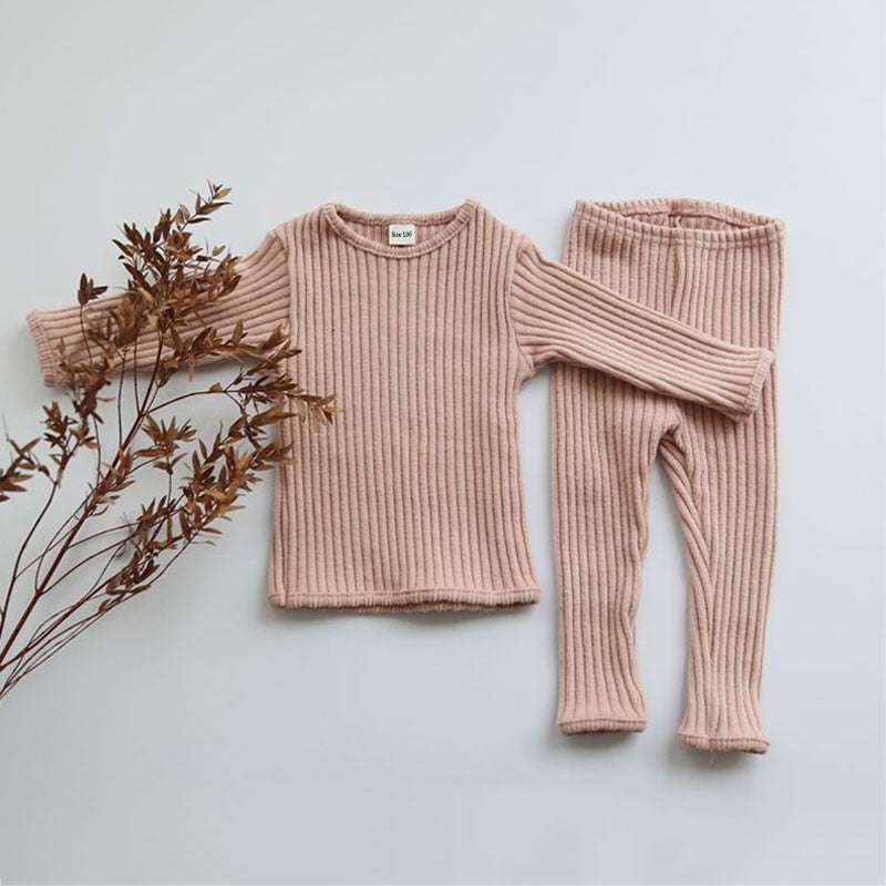 Pink ribbed knit top and leggings