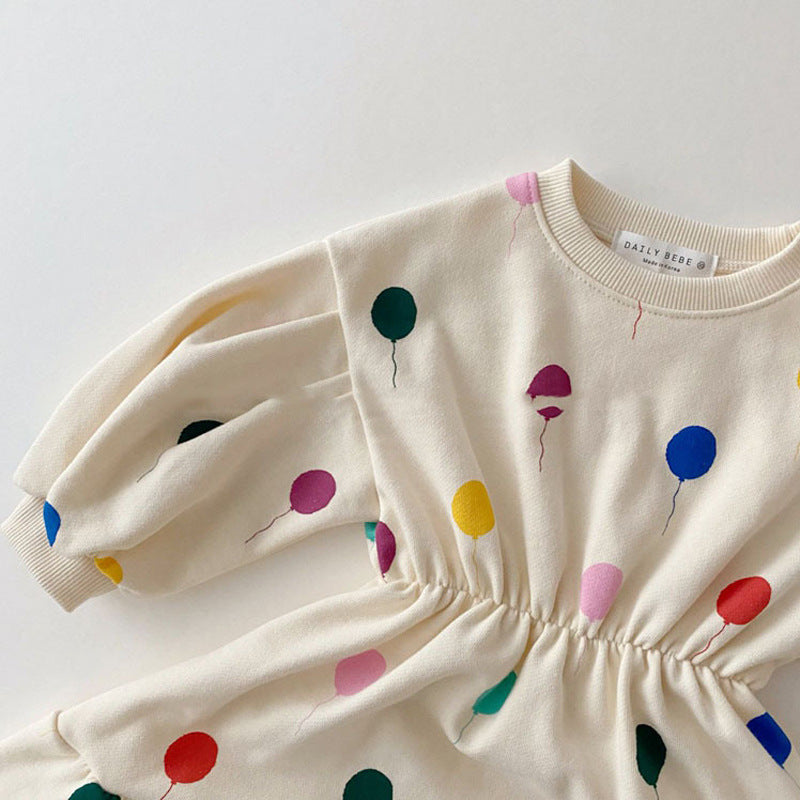 Close-up of elastic waist on polka dot dress