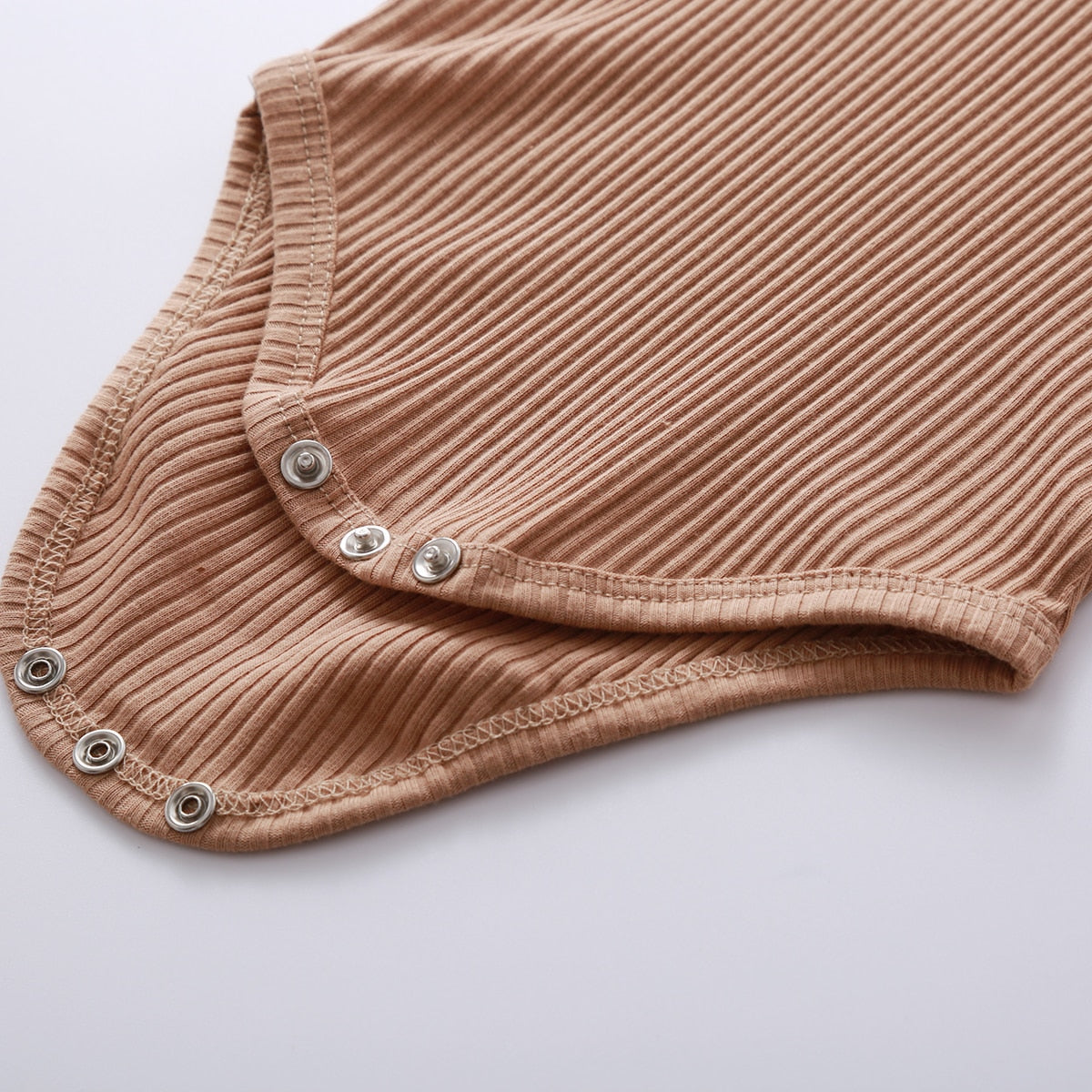 Close-up of snap crotch on ribbed bodysuit