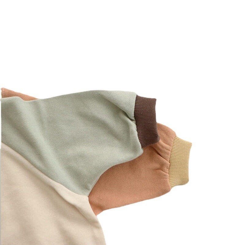 Close-up of colour block sleeve and cuff