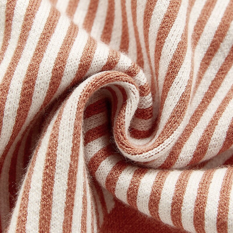 Close-up of rust striped knit