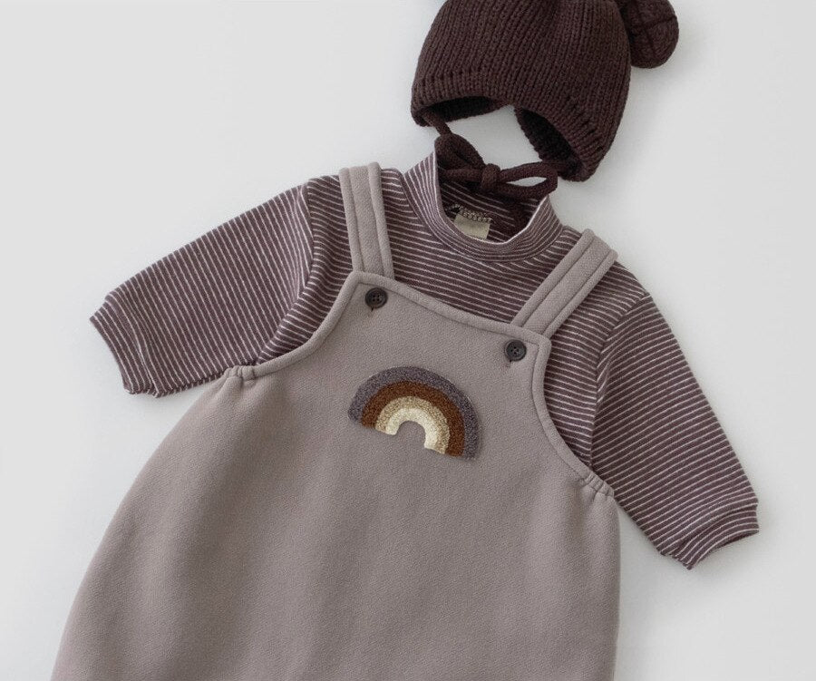 Coffee striped top layered under overalls with hat
