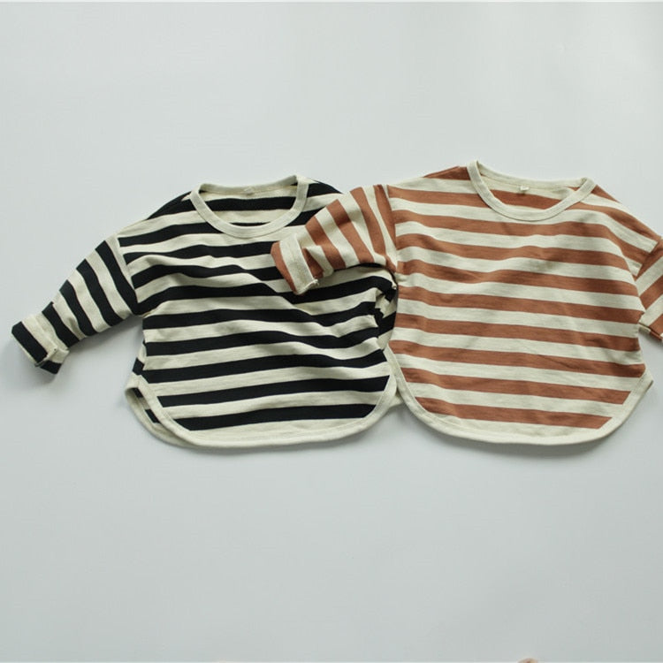 Black and orange striped tops laid flat