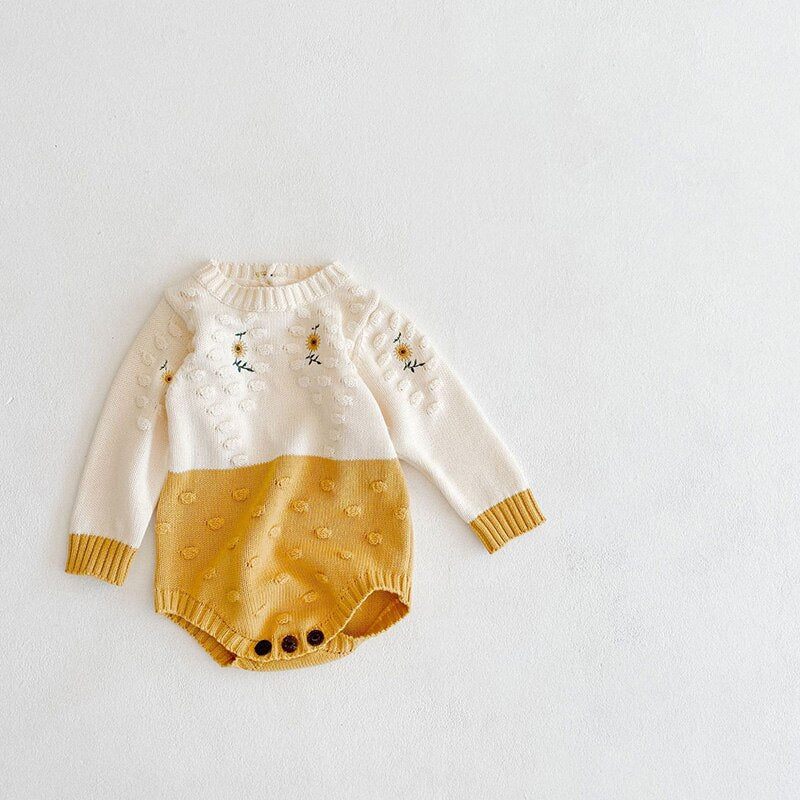Sunflower knit bodysuit on white background